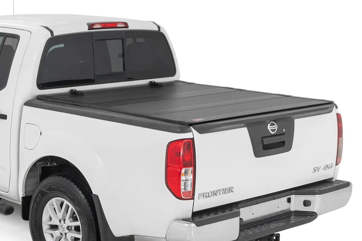 49520501  -  Hard Tri-Fold Flip Up Bed Cover - 5' Bed - Nissan Frontier 2Wd/4Wd (05-21) 1