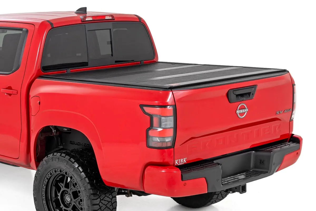 47520551B  -  Hard Low Profile Bed Cover - 5' Bed - W/Cargo Mgmt - Nissan Frontier (22-25) 1
