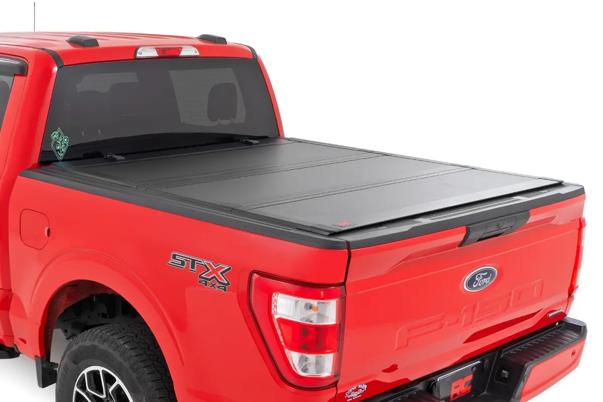 49220550  -  Hard Tri-Fold Flip Up Bed Cover - 5'7" Bed - Ford F-150 2Wd/4Wd (2015-2020) 1