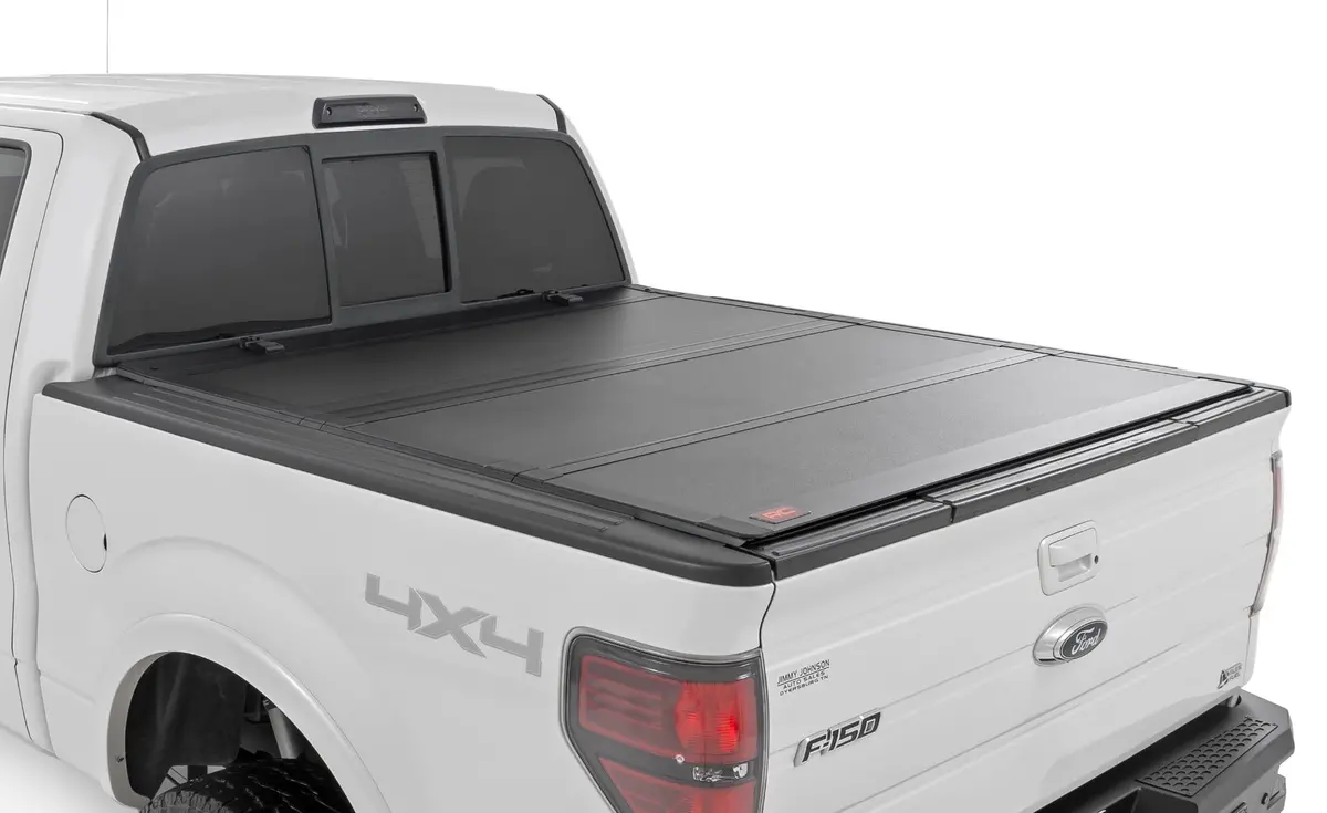 49214550  -  Hard Tri-Fold Flip Up Bed Cover - 5'7" Bed - Ford F-150 2Wd/4Wd (2004-2014) 1