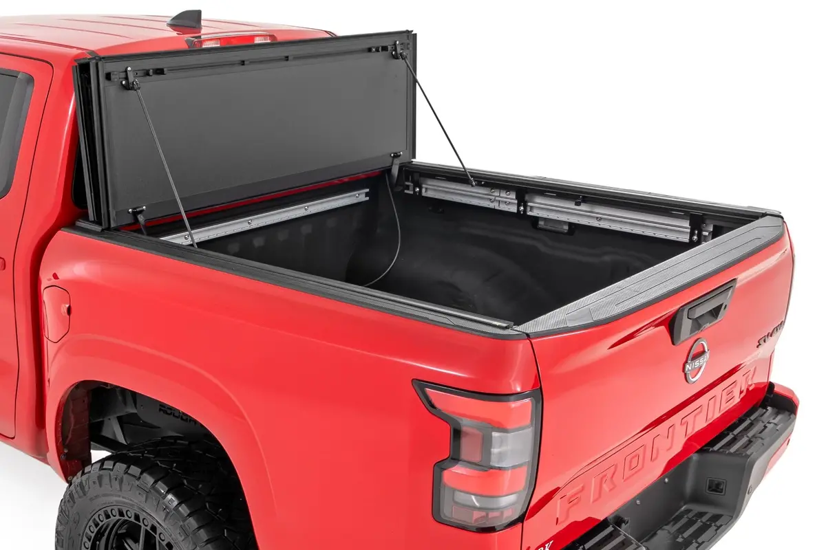 49520551A - Hard Tri-Fold Flip Up Bed Cover - 5' Bed - Nissan Frontier 2Wd/4Wd (22-25) 2