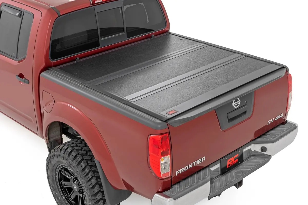 47520501B  -  Hard Low Profile Bed Cover - 5' Bed - Cargo Mgmt - Nissan Frontier (05-21) 1
